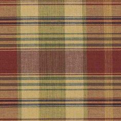 a plaid fabric with red, yellow and green colors on it's surface is shown in this image