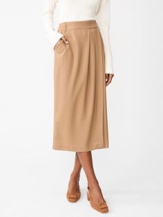 A workwear essential, the Carolina is a wrap-style pencil skirt that looks polished from desk to dinner. Finished with special details like side pockets and pleats. | J.McLaughlin Women's Carolina Skirt Khaki, Size 4 | Wool