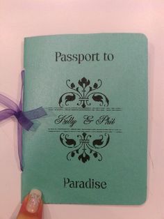 a hand holding a passport with a purple ribbon around it's edge and the word, passport to lily & peale