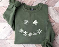 Snowflakes smiley face sweatshirt crewneck/Holiday sweater/Matching Christmas Sweater/Family Christmas gift/Snow flake design sweatshirt by PuraVidaDesignStudio on Etsy Matching Christmas Sweaters, Cute Winter Sweaters, Snowflake Embroidery, Snowflake Sweater, Embroidery Sweater, Merry Christmas Gifts, Holiday Sweatshirt, Family Christmas Gifts, Winter Sweatshirt