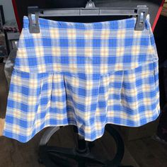 Pleated All Around Stretchy Pull On. Very Cute. Small: 26” Waist Medium: 28” Waist Large: 30” Waist X-Large: 32” Waist Casual Plaid Mini Bottoms, Plaid Cotton Skirted Bottoms, Casual Skirted Plaid Bottoms, Plaid Mini Tennis Skirt For Summer, Casual Plaid Skirted Bottoms, Summer Plaid Mini Tennis Skirt, Preppy Plaid Tennis Skirt For Summer, Retro Mini Length Bottoms For School, Blue Retro Cotton Skort