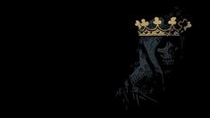 a black and gold wallpaper with a crown on it's head in the dark