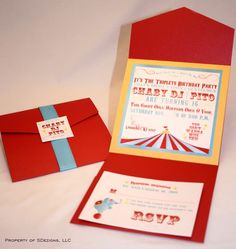 a circus themed birthday party is set up with red envelopes and blue ribbon around the edges