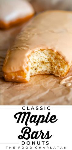 a close up of a doughnut with icing on it and the words classic maple bars