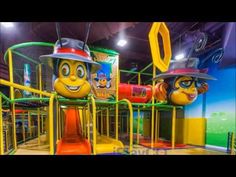 children's indoor play area with thomas the train and other characters in costume on it