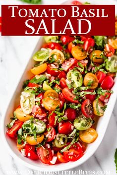 tomato basil salad in a white serving dish with text overlay