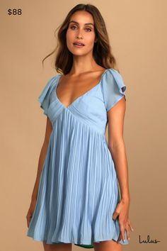 Set off to far-off destinations in style with the Lulus Amalfi Coast Light Blue Pleated Flutter Sleeve Mini Dress! Lightweight woven fabric shapes this pleated dress that has a V-neckline and fluttery short sleeves with elastic that can be worn on or off-the-shoulder. Contrasting pleats accent the bodice atop an empire waist and flowy mini skirt. Tying accent at the back. Hidden side zipper/clasp. Fit: This garment fits true to size. Length: Mid-thigh. Size medium measures 32" from shoulder to hem. Bust: Works best for A to C cup sizes. Waist: Loosely Fitted. Hip: Loosely Fitted. Undergarments: May be worn with petals, or no bra. Fabric: Fabric has no stretch. Fully lined. Shell: 100% Polyester. Lining: 95% Polyester, 5% Spandex. Hand Wash Cold. Do Not Bleach. Line Dry. Iron Low Heat. Impo Spring Pleated Flutter Sleeve Dresses, Summer Flutter Sleeve Dress For Date Night, Summer Date Night Dress With Flutter Sleeves, Flowy Pleated Mini Dress With Short Sleeves, Flowy Pleated V-neck Mini Dress, Flowy Pleated Mini Dress For Brunch, Spring Flutter Sleeve Dress For Date Night, Flowy Pleated Mini Dress For Spring, Blue Flutter Sleeve Mini Dress For Summer