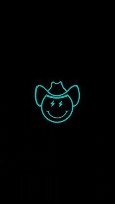 a black background with a blue neon cowboy hat on it's face in the dark