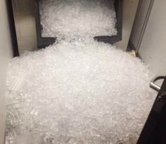 a pile of plastic bags sitting in an elevator