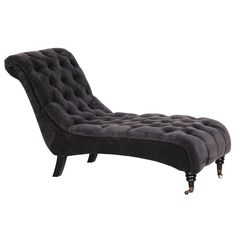 a black chaise lounge chair with wheels on the legs and footrests is shown in front of a white background