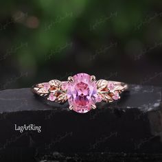 Oval cut Pink Sapphire Engagement ring Rose Gold Promise Ring Leaf Nature Inspired Bridal Ring Sept Gemstone Ring anniversary gifts Jewelry Ring Details: - Theme:Romantic Wedding & Engagement - comfortable band - Stone:6*8mm lab created pink sapphire Side stones: lab created pink sapphire - Total weight: 0.09 ctw (High Quality) - ring band width :1.5mm - ring thicknesses:1.2mm Wedding Band:0.065ctw Stones: 0.065ctw lab created pink sapphire +moissanite - ring band width :1.5mm - ring thicknesses:1.2mm - Metal choose:10k or 14k or 18k rose gold / white gold/yellow gold Service: -Completely Handmade -The highest quality in the industry -Money back guarantee -Materials from ethical sources -10 years of business experience -100% genuine -2-3 Week to finish jewelry -Accept customization We beli Wedding Rings In Pink Gold With Center Stone, Pink Gold Wedding Rings With Center Stone, Pink Gold Wedding Jewelry With Accent Stones, Pink Round Ruby Ring For Wedding, Pink Diamond Ring For Anniversary, Pink Gold Jewelry With Center Stone For Anniversary, Anniversary Pink Gold Jewelry With Center Stone, Oval Pink Gold Diamond Ring For Anniversary, Oval Flower Ring With Prong Setting For Anniversary