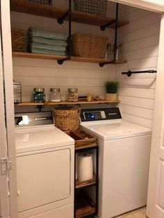 a washer and dryer in a small room