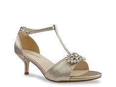 a women's gold high heeled sandal with an embellishment on the ankle