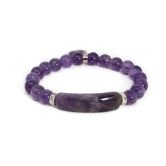 This beaded bracelet is made of natural Amethyst gemstone and has a beautiful heart charm!Our Gemstone Beaded Bracelets are designed to feel lightweight, comfortable, and effortless.Stringing each natural stone is part of our mindful Intention when we create this beaded bracelet, infusing positive energies, love, and happiness within each design.We combine meaningful symbols and natural gemstones giving this one accessory relevance in every way. Amethyst MeaningAmethyst is a natural tranquilizer Amethyst Natural Stones Beaded Bracelets For Meditation, Amethyst Gemstone Beaded Bracelets For Gift, Amethyst Gemstone Beads Bracelets As Gift, Amethyst Gemstone Beaded Bracelets As Gift, Gift Amethyst Gemstone Beaded Bracelets, Amethyst Gemstone Beaded Bracelet Gift, Adjustable Crystal Bracelet With Stones For Meditation, Adjustable Amethyst Bracelet, Lavender Beaded Bracelets With Natural Stones For Meditation