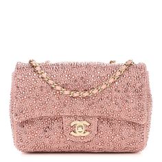 This is an authentic CHANEL Lambskin Crystal Diamante Small Flap in Light Pink. This stylish bag is crafted of pink lambskin with matching shimmery crystals covering the exterior. This bag features a leather threaded gold chain shoulder strap and a gold CC turn lock. The front flap opens to a matching leather interior with a zipper pocket. Sparkly Fashion, Glitter Bag, Chanel Tweed, Denim Quilt, Light Backpack, Chanel Caviar, Leather Thread, Beautiful Handbags