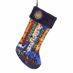 a harry potter christmas stocking hanging from a string