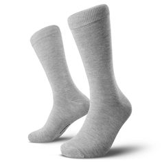 Crafted from a blend of 75% bamboo, these light grey bamboo crew socks for men aren't just a treat for your feet. They're a bear hug from Mother Nature herself. The addition of 23% polyamide ensures durability, while the 2% elastane allows for a snug yet forgiving fit. These socks are a testament to the magic that happens when handsome design meets eco-conscious materials. The bamboo fabric isn't just soft, it's like slipping your feet into the clouds, if clouds were breathable and kept odours a Green Bamboo, Sock Game, Socks For Men, Bear Hug, Bamboo Fabric, Packing Light, 6 Packs, Eco Conscious, Modern Man