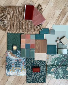 the floor is covered in many different colored tiles and rugs, including one with a candle