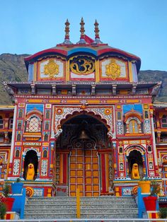 an elaborately painted building with steps leading up to it