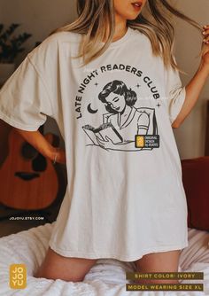 Late Night Readers  Club  - Comfort Colors Unisex T-shirt Late Night Readers Club shirt, bookish retro tshirt, bookworm oversized shirt, book gift for teens readers him her, vintage 50s 60s woman reading in bed Design by jojoyu. This item is made to order. If you want an oversized fit please size up one or two sizes! for reference, the model in the first photo is usually a medium but wearing XL for an oversized fit. Please note that the colors on the actual shirt might slightly differ from the p Bookish Tshirt, Fantasy Mystery, 60s Women, Book Merch, Bookish Merch, Fully Booked, Friend Group, Woman Style, Woman Reading