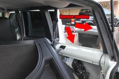 the rear door is open and there are arrows pointing to remove sliding doors from the vehicle