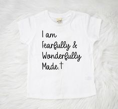 I am Fearfully and Wonderfully Made Christian Kids Shirt, Perfect for church or bible study! We use 100% ring spun cotton boutique quality shirts. Each shirt is individually packaged for added protection during shipping and perfect for gift giving! Vinyl design is applied to the shirt with a commercial grade heat press. Gentle cycle or hand washing is recommended. Hang to dry. Iron inside out. * Please keep in mind that all items are hand made and no two items are identical. Our turn around time Kids Christian Shirts, Toddler Bible Study, Dope Tshirts, Christian Kids Shirts, Toddler Bible, Funny Lines, Promise Keeper, Crafting Wire, Ribbon Storage