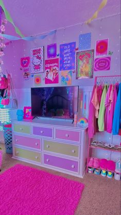 a bedroom with pink carpet and lots of toys on the floor, including a dresser