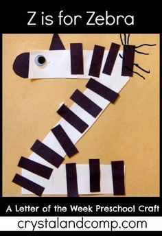 a zebra made out of strips of black and white paper with the words z is for zebra