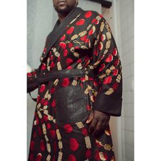 The Mansa Robe is built for executives of vision and discipline. In honor of Mansa Musa's honorable contributions to the cultural and scholastic advancement of Timbuktu, we celebrate the divine masculine in class. Designed for ultimate comfort and style, Mansa may double as a lounge robe and a classy over coat paired with tailored slacks and a fitted button up. Not for the faint of heart. Model wears a US men's large. Made to Order. Please allow 6-8 weeks for production. Details: 100% Super Wax Luxury Long Sleeve Robe For Loungewear, Luxury Fitted Long Sleeve Robe, Heart Model, Divine Masculine, Over Coat, Habotai Silk, Lounge Robes, Silk Shawl, Wax Print