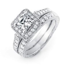 an engagement ring set with princess cut diamonds