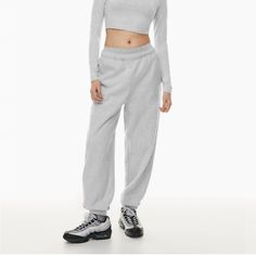 New With Tags Aritzia Grey Sweatpants, Comfy Winter Joggers With Elastic Cuffs, Winter Comfy Joggers With Elastic Cuffs, Basic Winter Sweats For Loungewear, Basic Winter Loungewear Sweats, Winter Full-length Pants With Ribbed Waistband, Basic Bottoms With Ribbed Cuffs, Fitted Sweatpants For Loungewear In Athleisure Style, Sporty Winter Bottoms With Elastic Cuffs