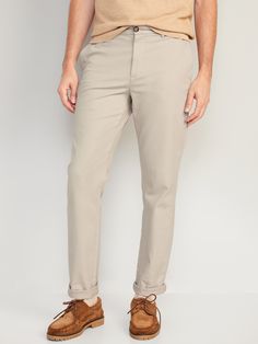 contoured waistband button closure belt loops zip fly hip pockets back welt pockets with button closure at left slim thigh and leg hits below ankle model is approx.  6'1" and wears size 32w x 32lmachine wash according to the care instruction label spandex 2% cotton 98% Fitted Mid-rise Pants With Belt Loops, Casual Fitted Full Length Dress Pants, Fitted Casual Dress Pants, Solid Slim Fit Tapered Leg Bottoms, Slim Fit Full Length Bottoms For Business Casual, Relaxed Fit Mid-rise Bottoms With Zip Fly, Mid-rise Relaxed Fit Bottoms With Zip Fly, Mid-rise Bottoms With Relaxed Fit And Zip Fly, Solid Color Casual Bottoms For Business Casual