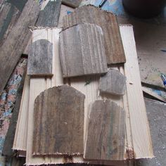 several pieces of wood sitting on top of a table