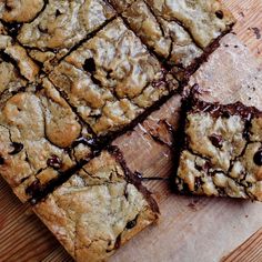 chocolate chip cookie bars cut into squares on a cutting board