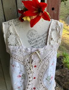 a cotton crochet top made from preloved/ vintage materials ~ embroidery,  and with tiny buttons centre front   SIZE m / lg bust 120 cm / 40" when fastened length is 83 cm / 21" mannequin is small gentle wash Bohemian Blouse, Womens Blouses, Bohemian Blouses, Wedding Gift Baskets, Cotton Crochet, Embroidered Top, Womens Clothing Tops, Crochet Top, Beauty Book