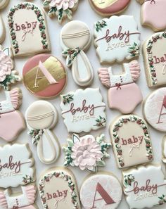 baby shower cookies decorated with pink and white icing