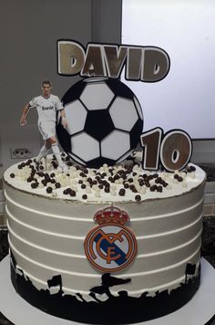 a birthday cake with a soccer ball on top