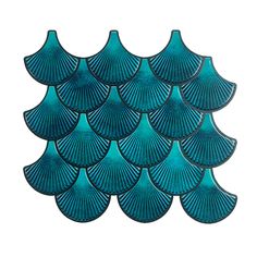 blue glass scallop tiles on a white background