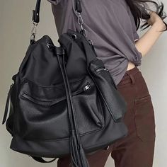 41964635881519 Black Bucket Bag With Pockets For Daily Use, Black Tote Backpack With Pockets, Black School Bag With Detachable Strap, Black Bucket Bag For Travel, School Satchel With Detachable Strap And Bucket Shape, Black Bucket Bag For Travel With Large Capacity, Black Bucket Bag With Large Capacity For Travel, Black Bucket Bag Backpack For On-the-go, Black Satchel Backpack With Large Capacity