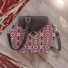 Embark on a journey of style and adventure with our handcrafted Cotton Jacquard Boho Sling Bag. Perfectly blending ethnic charm with contemporary flair, this sling bag is a testament to artisanal craftsmanship and bohemian spirit. Each bag is meticulously handwoven with intricate Jacquard patterns, reflecting a tapestry of cultural heritage and wanderlust. Made from high-quality cotton, it's not just a fashion statement but also a durable companion for your everyday escapades. Versatile and chic, our Boho Sling Bag is designed to complement any outfit, whether you're exploring the city streets or dancing under the stars at a festival. With its adjustable strap and spacious interior, it offers both style and functionality, allowing you to carry your essentials with ease and grace. Add a tou Backpack Shoulder Bag With Detachable Strap As Gift, Bohemian Brown Bag For Personal Use, Brown Bohemian Bag For Personal Use, Gift Pouch Box Bag With Adjustable Strap, Handmade Backpack Shoulder Bag As Gift, Handmade Backpack Shoulder Bag For Gift, Handmade Crossbody Bucket Bag As Gift, Boho Sling Bag, Hemp Bag