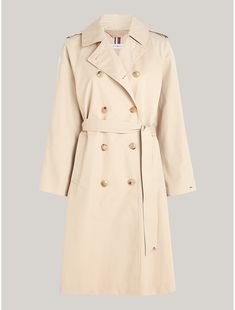 Tommy Hilfiger women's coat. This trench coat is designed with classic details such as a double-breasted closure, shoulder epaulettes, and a belted waist. Best of all, it's made from a premium organic cotton blend.  Material: 60% Organic Cotton, 40% Cotton (co). Classic Tommy Hilfiger Outerwear, Elegant Tommy Hilfiger Outerwear For Work, Chic Tommy Hilfiger Outerwear For Fall, Cotton Trench Coat, Tommy Hilfiger Store, Shoulder Epaulettes, Kids Sale, Tommy Hilfiger Women, Tommy Jeans