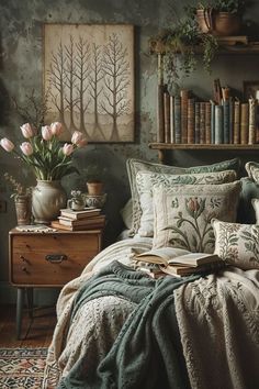 a bed with books and flowers on top of it next to a book shelf filled with books