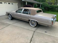 a car parked in front of a house