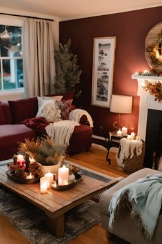 the living room is decorated for christmas with candles on the coffee table and other decorations