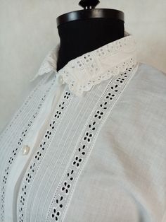 Vintage romantic blouse, button up, lace trim, long sleeve, 100% cotton. In very good clean condition. Flat measurements: shoulders - 37 cm/ 14.5'' chest/pit to pit/ - 49 cm/ 19.2'' sveeve/from shoulder/ - 64 cm/ 25.2'' lenght - 65 cm/ 25.5'' The measurements correspond to the size M Lace Trim Button-up Tops For Daywear, Classic Long Sleeve Shirt With Lace Trim, Button-up Tops With Lace Collar For Daywear, Long Sleeve Blouse With Lace Trim For Daywear, Long Sleeve Tops With Lace Work For Daywear, Daywear Button-up Blouse With Lace Cuffs, Victorian Blouse With Lace Collar For Spring, Victorian Lace Collar Blouse For Spring, White Victorian Blouse For Summer