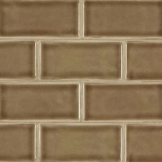 a close up view of a brown brick wall