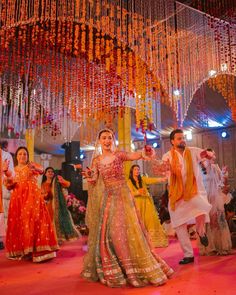 Gracing your feed with a dash of colour gleaming filled Sangeet night, stunningly captured by @sidishh_ .
.
.
.
Follow for more wedding inspiration @weddingbanquetsindia 
.
.
.
Image credits - @sidishh_ 
@yasmiinekhn 
@isla.events 
@deenarahmanlahore 
@henna_by_shamsa 
.
.
.
#sangeetnight #colour #bridesquad #bridetobe #pakistanwedding #pakistaniweddings #sangeet Sangeet Aesthetic, Sangeet Photoshoot, Live Food Stations, Sangeet Photography, Indian Wedding Food, Sangeet Dresses, Indian Sangeet, Sri Lankan Culture, Indian Wedding Aesthetic