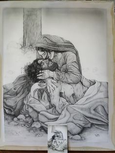 a drawing of a woman holding a baby in her lap while sitting on the ground