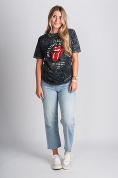 Rolling Stones mineral wash t-shirt from Lush Fashion Lounge women's boutique in Oklahoma City. Lush boutique in OKC has a variety of cute band tees, graphic tees, and more! This trendy vintage Rolling Stones t-shirt is a must have! You are sure to love this iconic graphic tee! Model is 5'9 size 29 wearing size small. 100% cotton Officially licensed made for American Needle by The Rolling Stones. Spring Stonewashed T-shirt In Washed Black, Spring Crew Neck Stonewashed T-shirt, Black Washed T-shirt For Fall, Trendy Summer Stonewashed T-shirt, Edgy Washed Black T-shirt For Spring, Casual Acid Wash T-shirt With Frayed Hem, Trendy Stonewashed T-shirt, Trendy Bleached T-shirt With Relaxed Fit, Trendy Stonewashed Crew Neck T-shirt