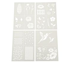 four pieces of white paper with flowers and birds on them